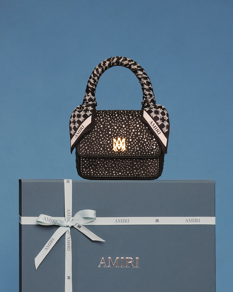 Amiri 5 Amiri -Amiri 10.06.25 AMIRI HOLDAY 0072 4x5 81118dfa 68a1 475c 8c46 7cd4547e2966